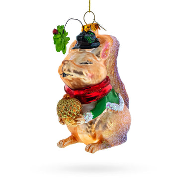 Squirrel Cradling an Acorn Glass Christmas Ornament