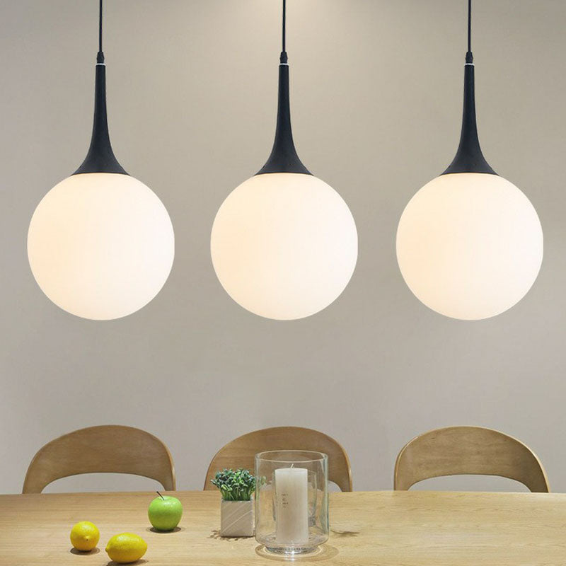Adeline Modern Globe Pendant - Stylish Glass Light for Dining Rooms