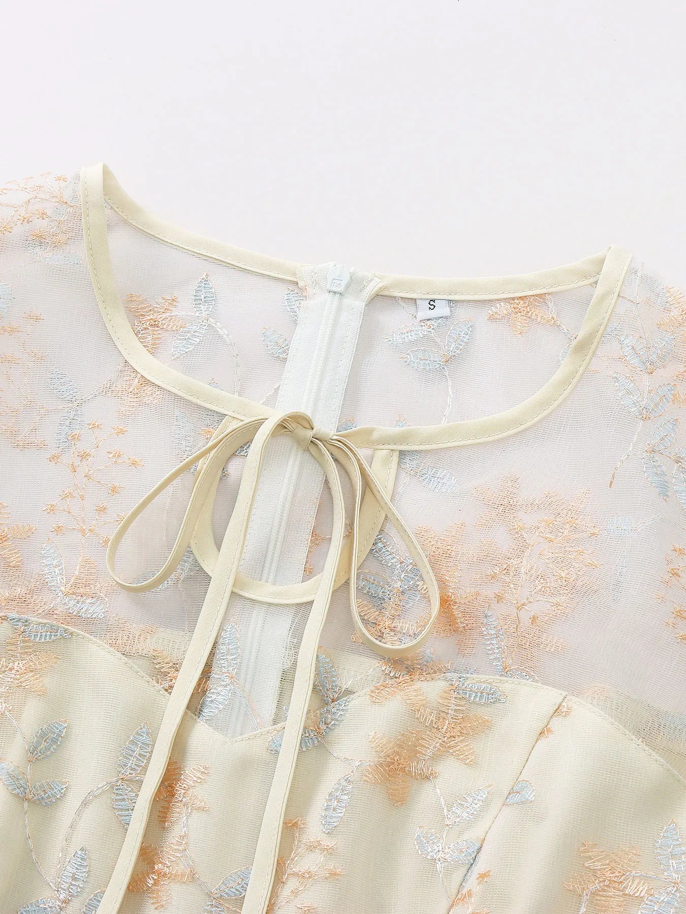 Embroidered Sheer Overlay Midi Dress with Tie Neck